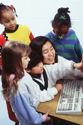 teacher instructing young children