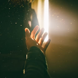 light shining through a hand